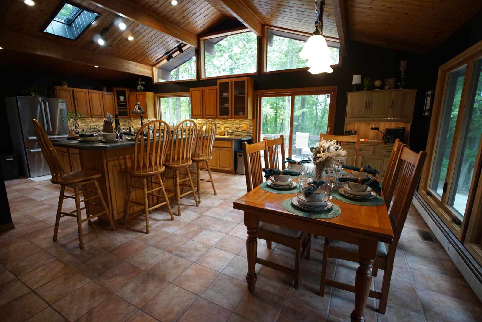 Kitchen dining table and bar with stools