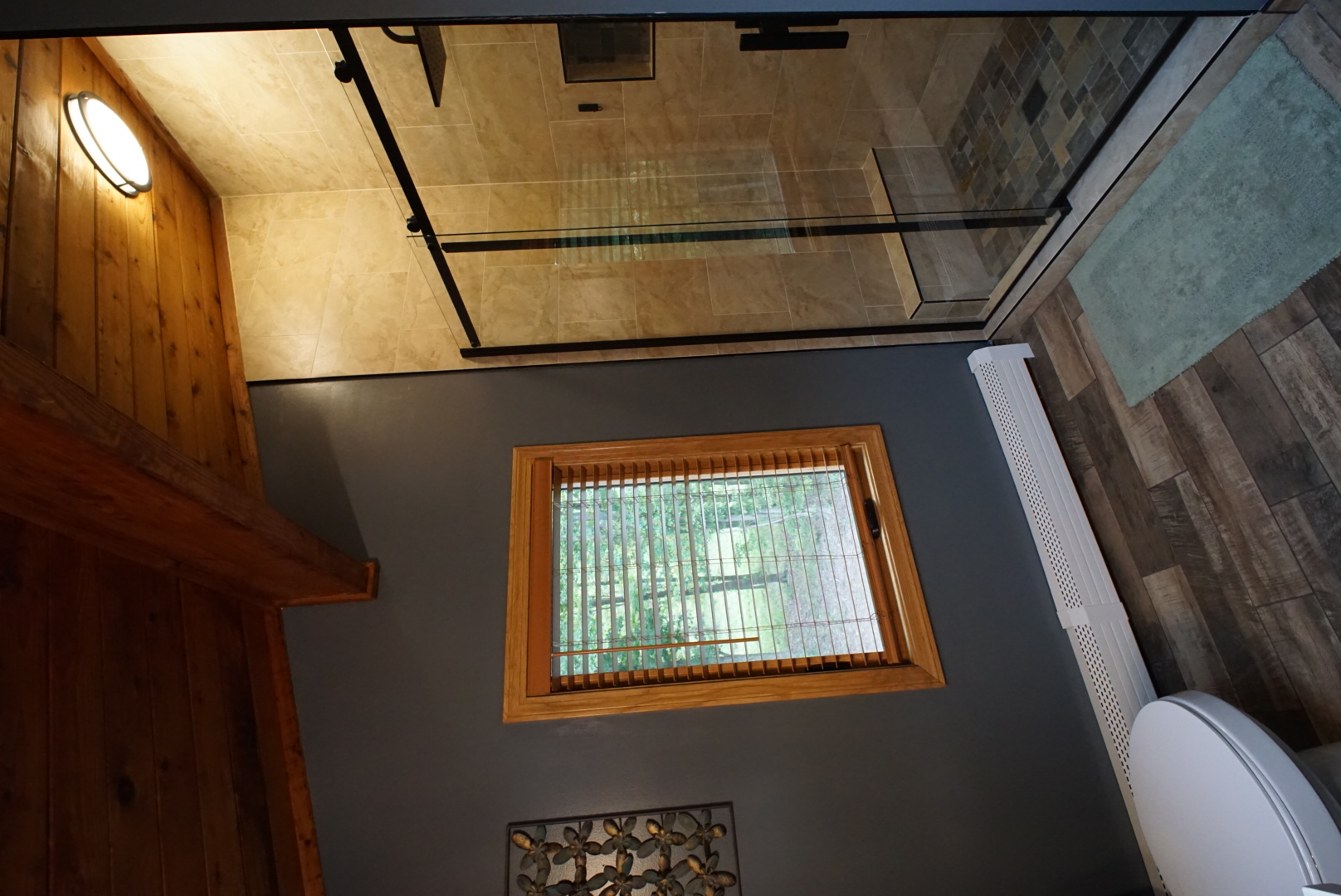 Upstairs bathroom walk-in shower with skylight